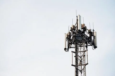 Communication tower on the blue sky Stock Photos
