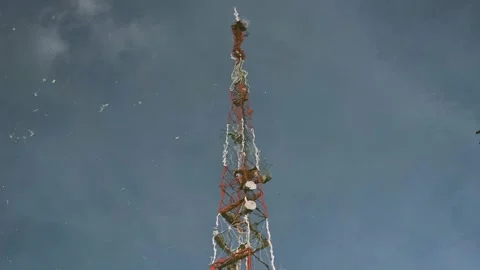 A communication tower stands 動画素材 344527976