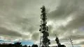 communication towers on mountain top cloudscape sun light HD Footage