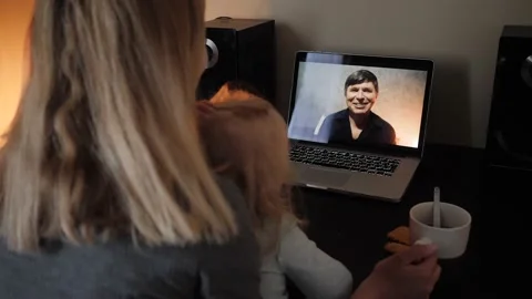 Communication via video link with relatives during the quarantine Stock Footage 131009576