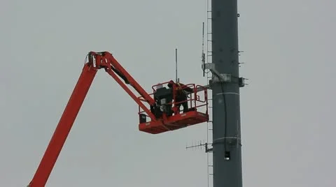 Communication workmen installing rf antennas Stock Footage 10806193