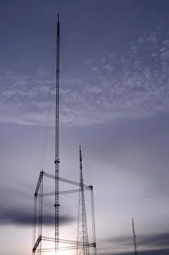 Communications antenna tower in sunset 스톡 사진