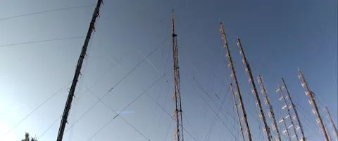 Communications antennas with sky background, Anamorphic 스톡 동영상 143387609