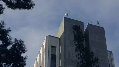 Communications Equipment on Top of a High Rise Building Stock Footage 221587615