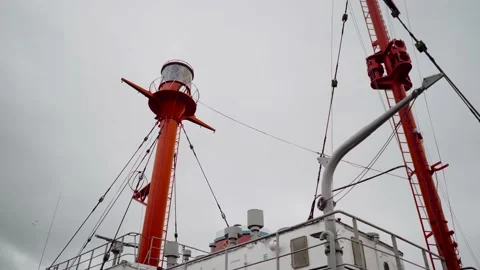 Communications masts of a ship red color. Radio antena on the ship bridge during Stock Footage 144231791