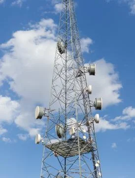 Communications tower with blue Cloud sky background Stock Photos