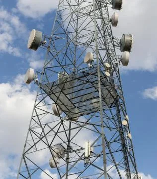 Communications tower with blue Cloud sky background Stock Photos