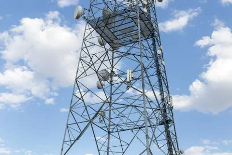 Communications tower with blue Cloud sky background Stock Photos