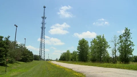 Communications tower with clouds Stock Footage 76892660