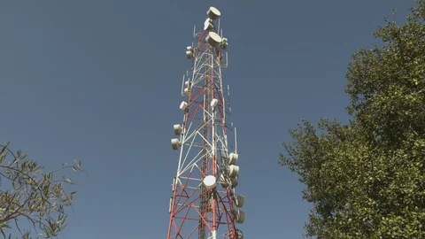 A communications tower with multiple communications dishes Stock Footage 99935525
