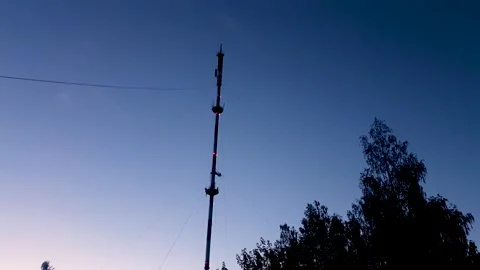 Communications tower at night. Telecommunication tower, transmitting, internet Stock Footage 280597237