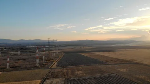 Communications tower with the sun at sunset in the background. Stock Footage 99702584