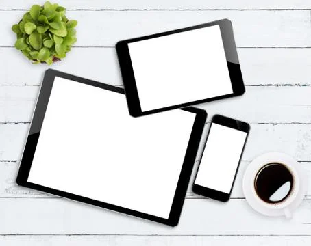 Communicator device on white wood table Foto stock