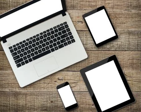 Communicator modern electronic device white screen display on wood background Stock Photos