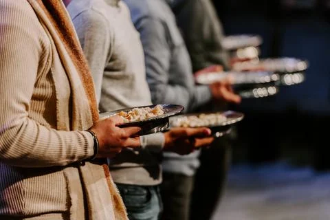 Communion with bread and wine during the service in the assembly Stock Photos
