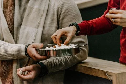 Communion with bread and wine during the service in the assembly Stock Photos