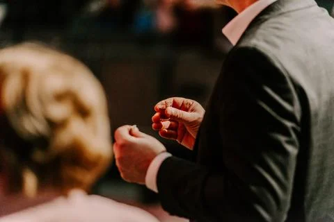Communion with bread and wine during the service in the assembly Stock Photos