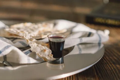 Communion. Religious tradition of breaking bread. Bread and wine Stock Photos
