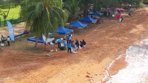 Community Beach Cleanup Volunteers Sorting Waste - PD, Malaysia - 8.19.2025 Stock Footage 315064342