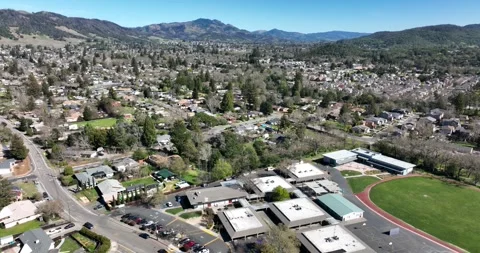 Community Between the Mountains Drone Aerial View Santa Rosa California USA Stock Footage 335669282