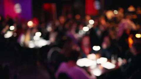 Community connection: Defocused copy space in a bar scene captures the diverse Stock Footage 267622096