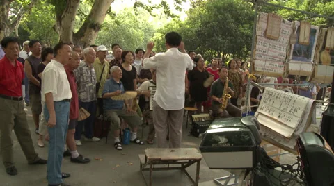 Community singing in a Park Stock Footage 37701968
