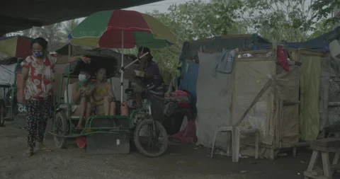 A community under the bridge in Cagayan de Oro, City, Mindanao, Philippines Stock Footage 230031388