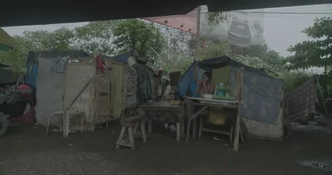 A community under the bridge in Cagayan de Oro, City, Mindanao, Philippines Stock Footage 230031485