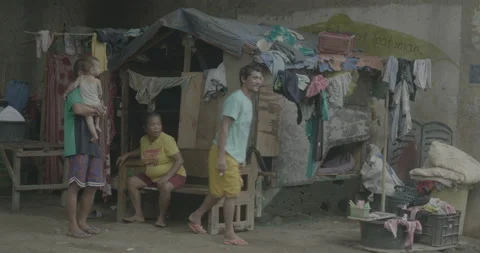 A community under the bridge in Cagayan de Oro, City, Mindanao, Philippines Stock Footage 230031696