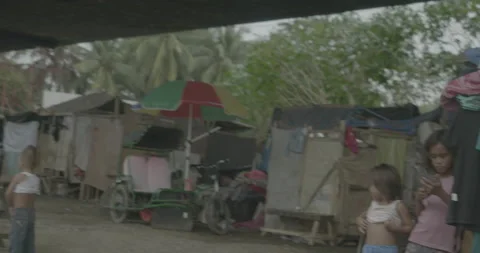 A community under the bridge in Cagayan de Oro, City, Mindanao, Philippines Stock Footage 230031863