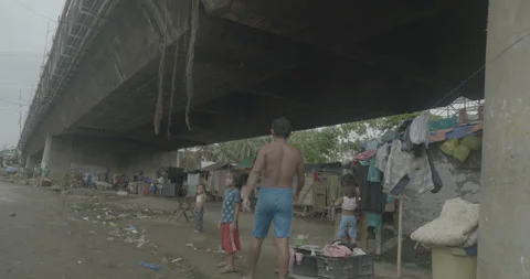 A community under the bridge in Cagayan de Oro, City, Mindanao, Philippines Stock Footage 230031924