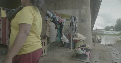 A community under the bridge in Cagayan de Oro, City, Mindanao, Philippines Stock Footage 230032149
