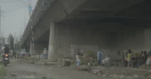A community under the bridge in Cagayan de Oro, City, Mindanao, Philippines Stock Footage 230032403