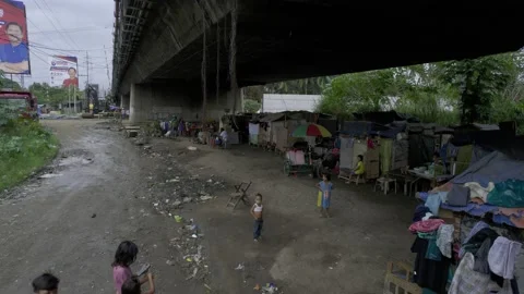 A community under the bridge in Cagayan de Oro, City, Mindanao, Philippines Stock Footage 230033014