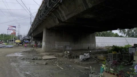 A community under the bridge in Cagayan de Oro, City, Mindanao, Philippines Stock Footage 230033365