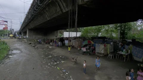 A community under the bridge in Cagayan de Oro, City, Mindanao, Philippines Stock Footage 230033494