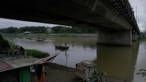 A community under the bridge in Cagayan de Oro, City, Mindanao, Philippines Stock Footage 230033532