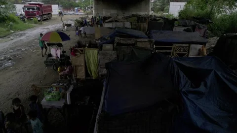 A community under the bridge in Cagayan de Oro, City, Mindanao, Philippines Stock Footage 230033535