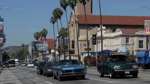 Commute Home to Work in Hollywood Sunset Strip Boulevard, LA Car Traffic Passing 库存影片 24420125