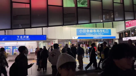 Commuter Crowd Walking at Shimokitazawa train station in Tokyo , Japan Stock Footage 265134693