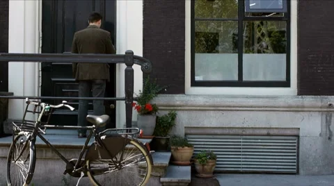 Commuter goes to work on bicycle Stock Footage 8692083