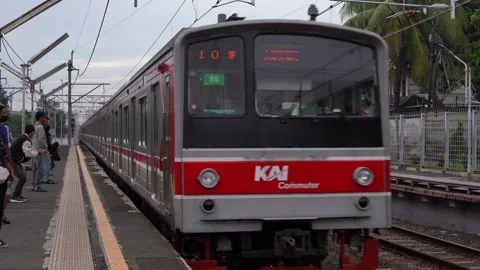 Commuter Line passengers wait for the train Stock Footage 300543238