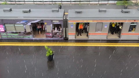 Commuter line train in heavy raining Stock Footage 301181744