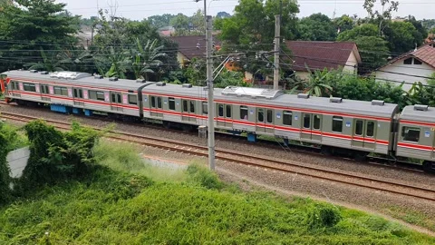 Commuter line train passes by. high angle shot Stock Footage 291695001
