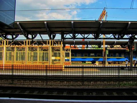 Commuter Train Arrival at Sunset Stock Photos