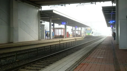 The commuter train is arriving at the Espoo station, Finland Stock Footage 143153221