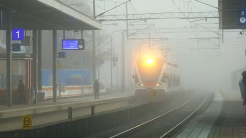 The commuter train is arriving at the Espoo station, Finland Stock Footage 143153654