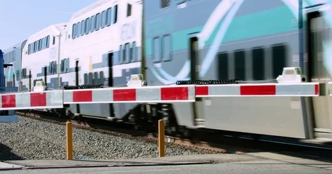 Commuter train carries passengers to work to Los Angeles Union Station 4K RAW Stock Footage 73302979