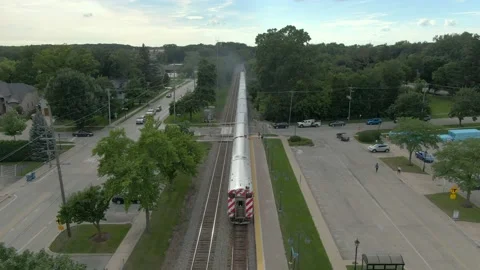 Commuter Train departs Bartlett, IL Stock Footage 202188197