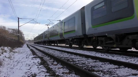 Commuter train engine loco railroad snow landscape Stock Footage 83364280